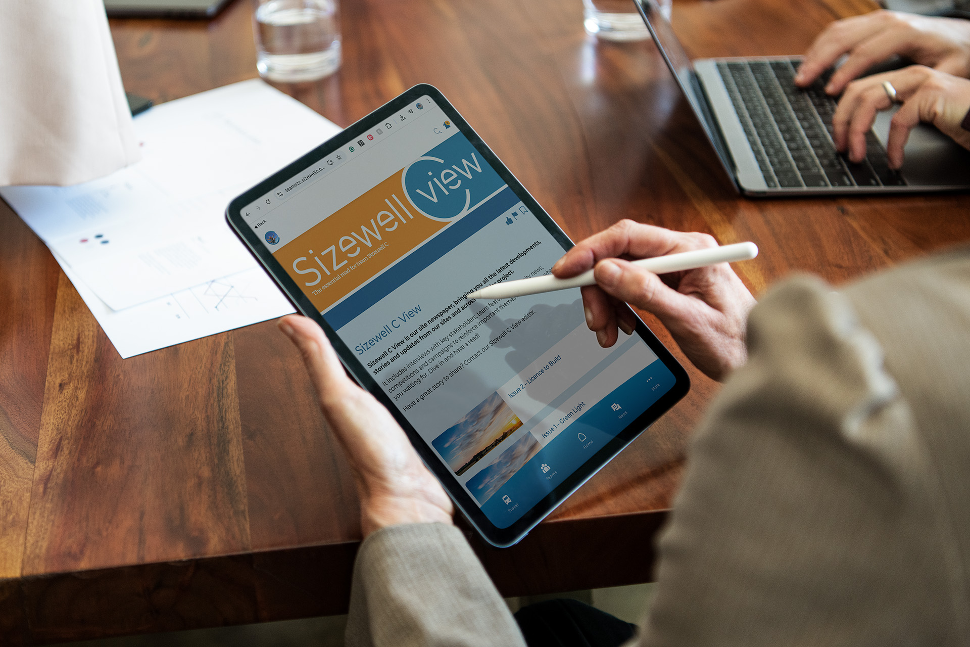 Office worker using TeamSZC PWA extranet website