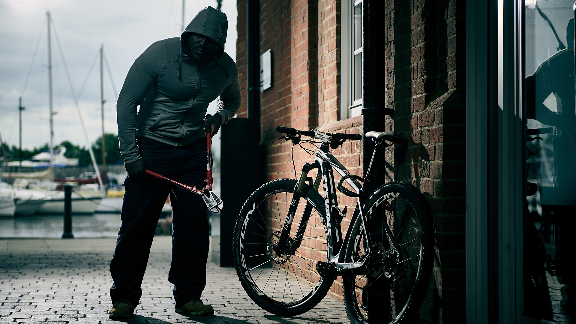 Bicycle theft in progress with bolt croppers